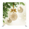 Patterned Golden Bauble With Glitter Gold Bow Hanging On A Christmas Tree Media Wall
